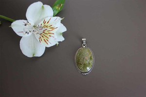 Silver pendant with a natural stone LH027